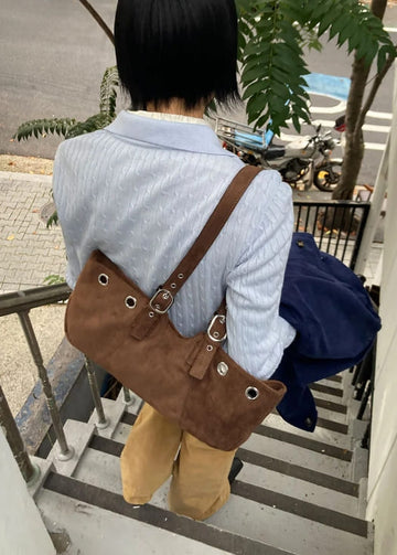 EYELET BELTED STRAP BAG